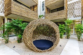Eco-sustainable Luxury Between Beach Hotspots & Tulum Town by Stella R