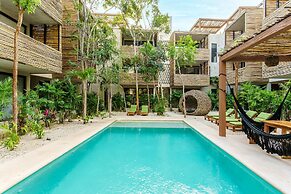 Eco-sustainable Luxury Between Beach Hotspots & Tulum Town by Stella R