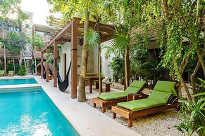 Eco-sustainable Luxury Between Beach Hotspots & Tulum Town by Stella R