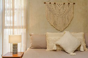 Eco-sustainable Luxury Between Beach Hotspots & Tulum Town by Stella R