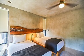 Eco-sustainable Luxury Between Beach Hotspots & Tulum Town by Stella R