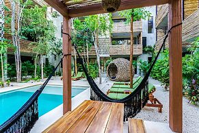 Eco-sustainable Luxury Between Beach Hotspots & Tulum Town by Stella R