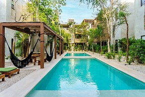 Eco-sustainable Luxury Between Beach Hotspots & Tulum Town by Stella R