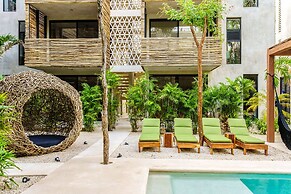 Eco-sustainable Luxury Between Beach Hotspots & Tulum Town by Stella R