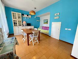 Colorful House With Pool and Garden