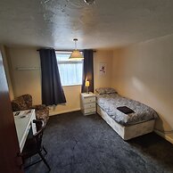 The Coach House Rooms