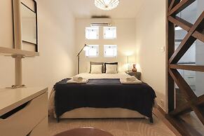 Golden Studio Inside Castle Walls by Homing
