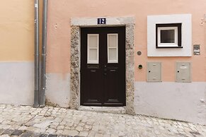 Golden Studio Inside Castle Walls by Homing
