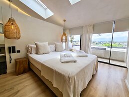 S Estancia Suites
