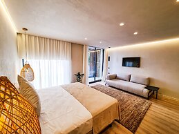 S Estancia Suites