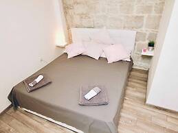 Dalmatian White Shell Apartment