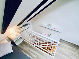 Dalmatian White Shell Apartment