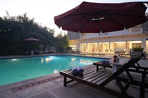 Astroport Sariska Treetop by Eight Continents