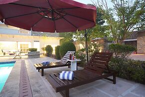 Astroport Sariska Treetop by Eight Continents
