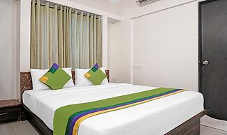 Treebo Diamond Residency - DDPK Inn