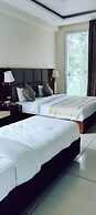 Manuni Inn - Riverside Hotel
