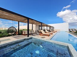 Kaab by the Beach. Condo with roofpool