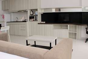 Comfortable And Spacious Studio At Azalea Suites Apartment