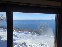 Toya Cliff House