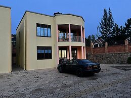 The Mugabi's Spacious Private Room