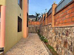 The Mugabi's Spacious Private Room