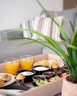 Ebenus Suites by Checkin