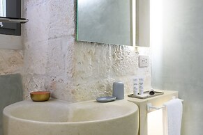 Vico Bianco Raro Rooms Collections