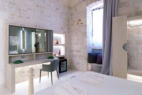 Vico Bianco Raro Rooms Collections