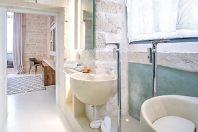 Vico Bianco Raro Rooms Collections