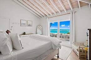 Beachfront White Palm Villa - Tar Bay