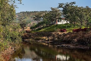 The Lazy River Cottage by cosmicstays