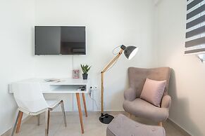 Luxury Loft with a Balcony by CloudKeys
