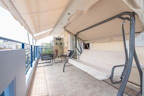 Luxury Loft with a Balcony by CloudKeys
