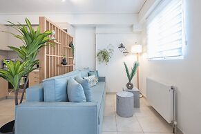 Luxury Loft with a Balcony by CloudKeys