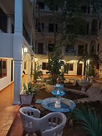 hotel y hostal nojoch che