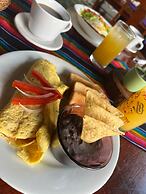 hotel y hostal nojoch che