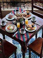 hotel y hostal nojoch che