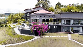 Tau House