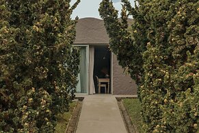 Tau House