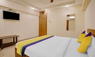 New Harshita inn By Glitz Hotel