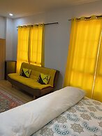 July Apartments