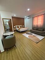 July Apartments