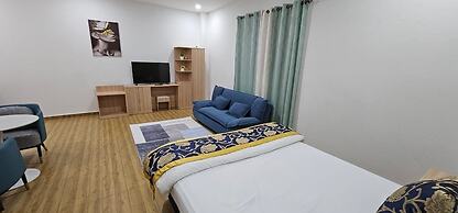 July Apartments