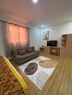 July Apartments