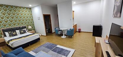 July Apartments