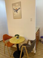July Apartments