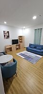 July Apartments