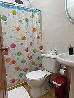 July Apartments