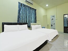 Oyo 90596 Casaria Inn