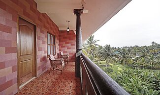 Treebo Trend Green Palm Resorts